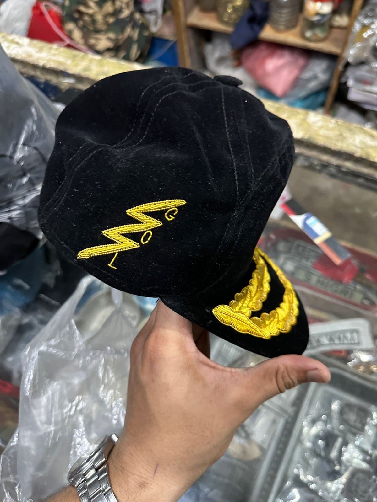 Ceremonial cap and uniform detailing produced for institutional requirements