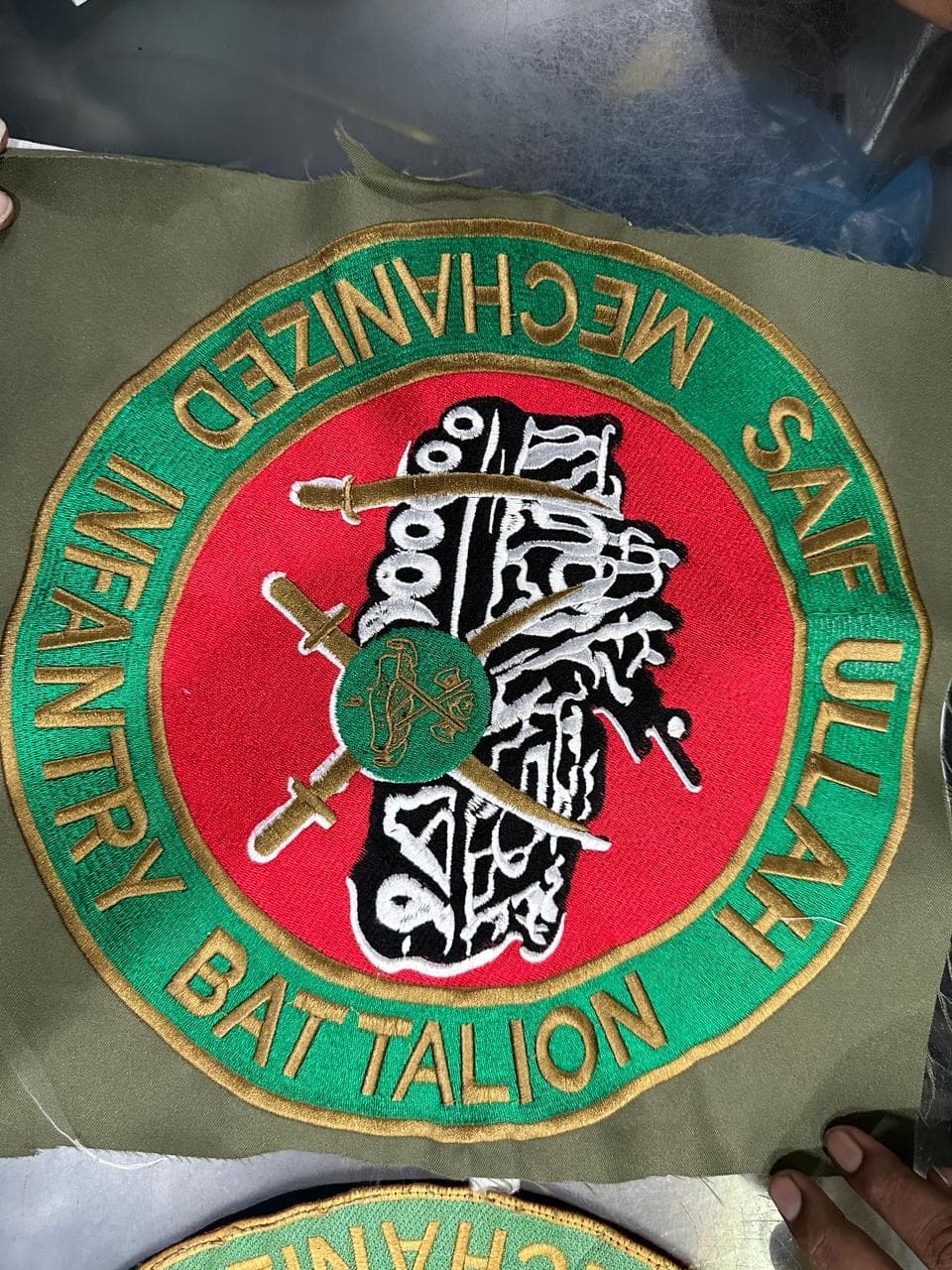 Detailed embroidered badge work made by Khan Badge Makers